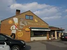 隣接するグルマンヴィタル本店