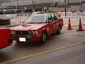 Y31型セドリック営業車 香港タクシー(このモデルは、エンブレムがセドリック専用ではなく、日産共通のロゴに変更されている。)