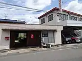神崎自転車預かり所中央に金田一レンタサイクルの暖簾がかかっている。