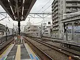 上りホームより両渡線設置につき3 - 6番線の入替信号機及び種別表示（2016年1月）