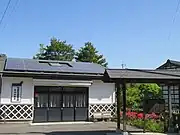 亀長電気工場（のち土橋電気製鋼所）跡に立つ碑