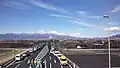 佐久南IC入口付近の歩道橋より撮影。2011年3月の建設時の様子。画像手前が国道142号、奥が中部横断自動車道本線である。奥に見える雪山は浅間山系。
