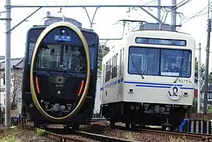 叡山本線の観光列車「ひえい」ときんいろモザイクラッピング車両（元田中〜茶山）
