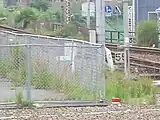 駅構内に立つ可部線の0キロポスト
