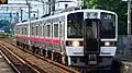 大曲駅に入線する719系。