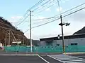関戸バス停留所近傍の高速バス利用者用駐車場（山口県道・広島県道1号岩国大竹線より）（2007年3月9日撮影）