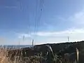 真弓山東端の常磐線64号鉄塔付近から南方に望む風神山(中央付近)
