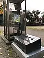 弁天公園内にある「公衆電話発祥之地」碑