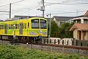 5005編成「なの花」(鰭ヶ崎-小金城趾)開業100周年・『普通の女子校生が【ろこどる】やってみた。』コラボレーション記念装飾