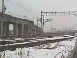阿武隈急行線収束部上の高架線は上り本線遠くに見える高架線は東北新幹線