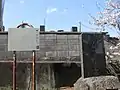 秋山公供養塔、墓・木像説明板（光昌寺境内）