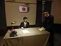 警察から報告を受ける領事部の幹部