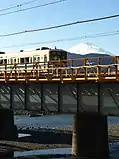小田急小田原線と富士山の風景