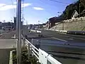 木曽団地東交差点付近。道路の拡幅が進められている