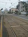 駒場車庫前停留場の車庫に向かう分岐部分の写真その2（2017年5月撮影）。