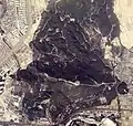 1976年度(昭和51年)に撮影された国土交通省 国土地理院 地図・空中写真閲覧サービスの空中写真を基に作成高座山を撮影した航空写真。写真左側の白い部分は、建設途中の高蔵寺ニュータウン。