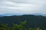 山頂から北アルプスを望む