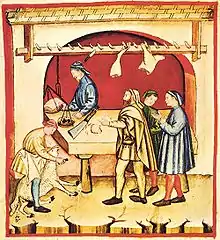 This picture is showing a 14th-century butcher doing his trade in a traditional manner.