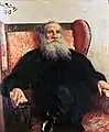 『ばら色のソファに座るレフ・トルストイ』、1909年
