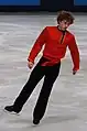 ルバシカを着用するアダム・リッポン