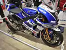 2011年 - 2013年: メインスポンサーが付かず、ヤマハのコーポレートカラーでの参戦。写真は2011年のロレンソ車。