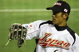 東日本大震災復興支援ベースボールマッチでのホームユニフォーム岡田幸文、2012年
