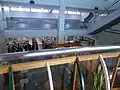 2Fから1Fの土産店を望む