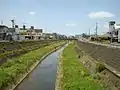 第二寝屋川高砂橋より下流を望む。手前に見える橋は石塚橋、奥に見える橋は久保橋。