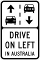 (G9-V170) A sign reminding motorists that traffic in Australia travels along the left side of the road. These signs are placed in areas with high tourist traffic, such as roadways near airports.