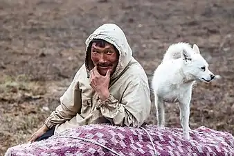 A Selkup man with his dog