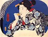 国芳画。団扇絵の画面を鏡に見立てる。