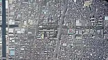 南方貨物線と名古屋港線の交点付近(2007年当時)。短絡線と隣接していた野球場は撤去され、跡地は「マックスバリュ 南十番町店」および「コーナン 南十番町店」になっている。