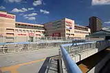 有松駅とイオンタウン有松（2012年（平成24年）10月（撮影位置））。