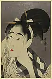 Colour print of a closeup of a heavily made-up woman's face. The woman cranes her head left as she wipes her face with a patterned cloth.