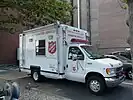 救世軍が使用する1997-2002 Ford E-350 cutaway