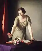 花を飾る女性 (1921)