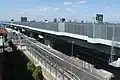 国道1号を横切ってのち、名古屋市港区の住宅密集地帯を南下する（富田IC - 南陽IC間）。