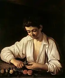 『果物の皮を剥く少年』（1592年頃）ロンギ財団（ローマ）