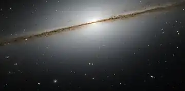 2006年にHSTのACSで撮像された渦巻銀河NGC 7814。典型的なエッジオン銀河で、その姿がおとめ座のソンブレロ銀河と似ていることから、Little Sombrero とも呼ばれる。