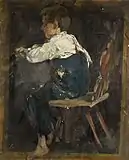 座っている少年