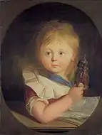 絵本を持つ子ども