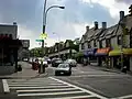 Corner of Austin St. and Lefferts Blvd.