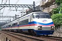 創立100周年ステッカーを貼付したAE100形(2009年6月2日 / 船橋競馬場 - 谷津)