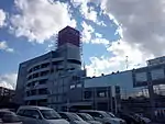 ダイエー末期の店舗外観、この時点でイオンへの看板架け替え工事が進んでいた。2015年8月26日撮影