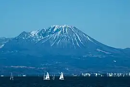 北西より