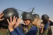 Dallas Cowboys Cheerleaders come to a forward operating base in Iraq to entertain troops.