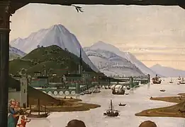 遠景の湖畔と行き交う船の風景