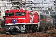 EF81 95「レインボー色」（2024年3月 北浦和駅 - 与野駅間)