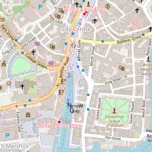 Street map of central Bristol with a red line showing the route from original location south towards the western edge of the harbour