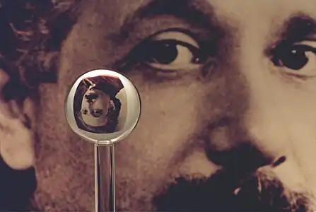 An image of one of the most accurate human-made spheres, as it refracts the image of Einstein in the background. This sphere was a fused quartz gyroscope for the Gravity Probe B experiment, and differs in shape from a perfect sphere by no more than 40 atoms (less than 10 nanometers) of thickness. It was announced on 1 July 2008 that Australian scientists had created even more nearly perfect spheres, accurate to 0.3&nbsp;nanometers, as part of an international hunt to find a new global standard kilogram.